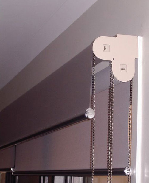 Double roller blinds bracket installed architrave